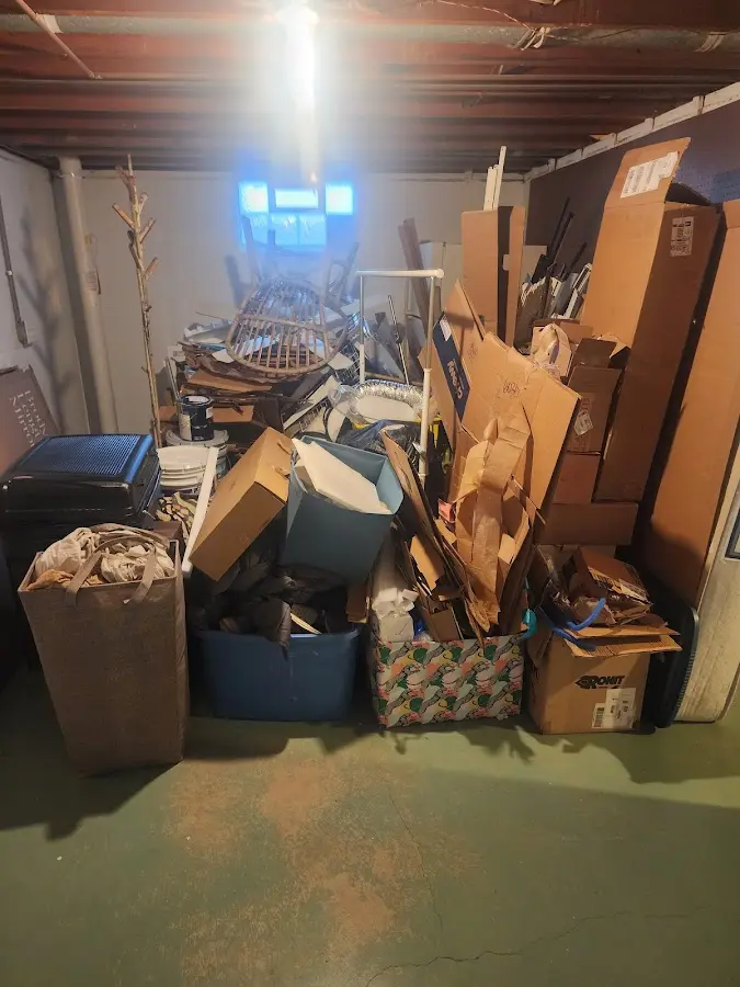 Roll-off dumpster container at job site for Concrete Dumpster Rental in South Russell